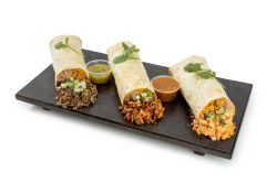Super Burrito: Includes rice, beans, your choice of meat, cheese, sour cream, guacamole, pico de gallo, and lettuce. Served with your choice of red or green salsa, inside or on the side. For a Burrito Bowl: Choose no tortilla.