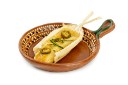 Tamale Cheese Each: A soft, handmade tamale filled with melted cheese and mild green chiles, wrapped in a traditional corn husk and steamed to perfection. A comforting, flavorful vegetarian option that's perfect on its own or paired with your favorite sides.