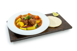 Albondigas Large 32oz: A warm and comforting homemade soup featuring tender beef meatballs simmered in a rich tomato‑based broth. Loaded with fresh vegetables and served with warm corn tortillas and lime.