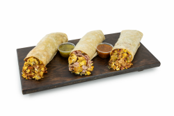 Breakfast Burrito: Made with your choice of meat, eggs, potatoes, and cheese. Includes your choice of red or green salsa, served inside or on the side.