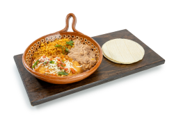Chile Relleno Combo: A classic chile relleno dipped in fluffy egg batter, simmered in a rich tomato‑based sauce, and topped with melted cheese and fresh garnishes